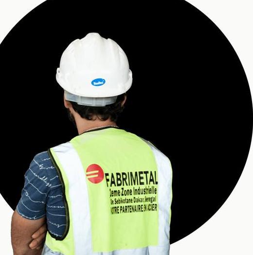 An MMD employee in plant safety gear